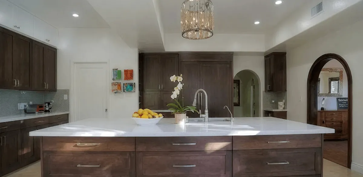 Cabinet refacing project with updated kitchen cabinets and island in Minneapolis, MN
